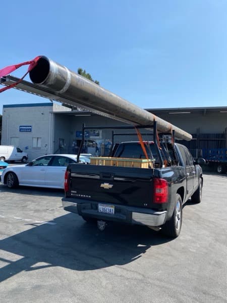 Curri flatbed truck loaded with materials for a same-day delivery