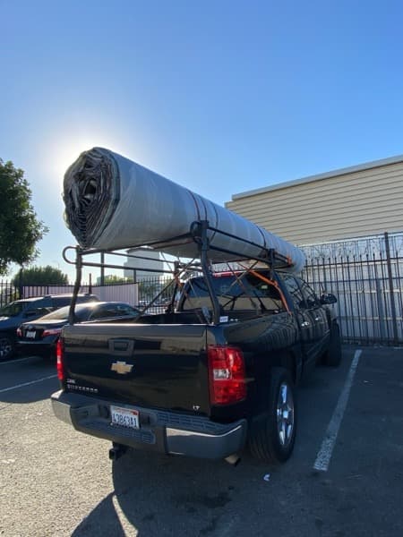 Flatbed truck arriving at a commercial job site