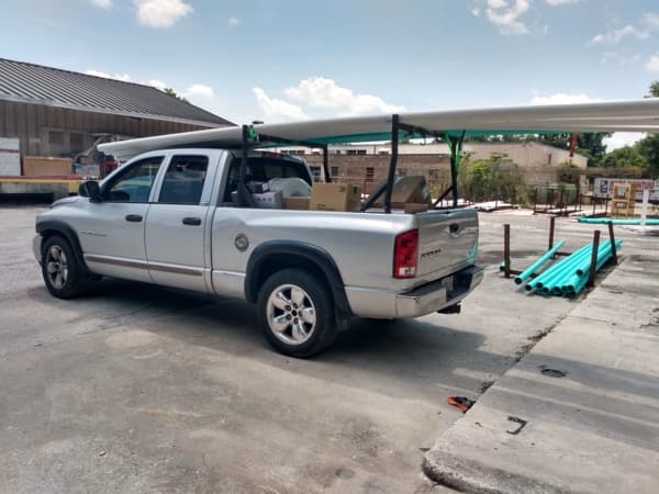 Flatbed loaded with lumber and steel beams